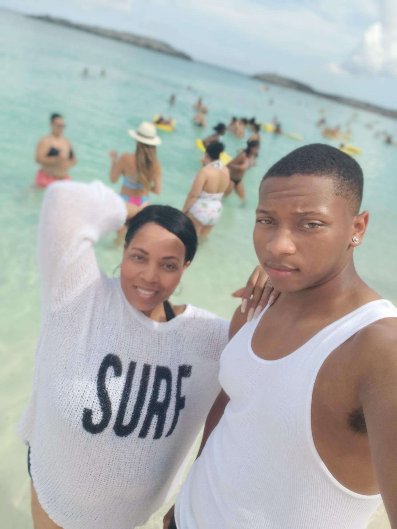 Two people at the beach in the Bahamas
