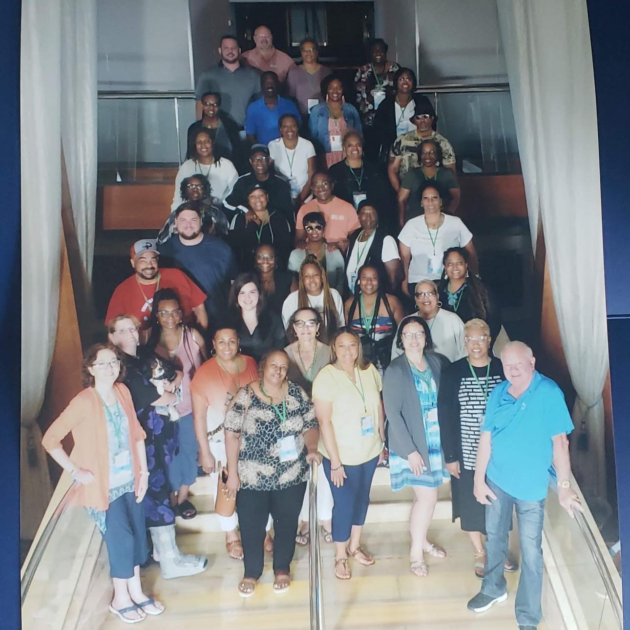 Large group of travel agents on stairs at Xstream Travel event