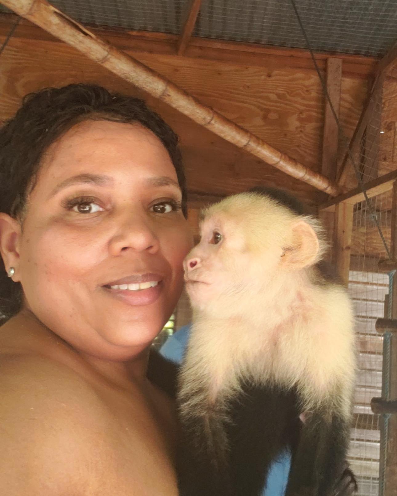Ms. Mia taking a selfie with a capuchin monkey