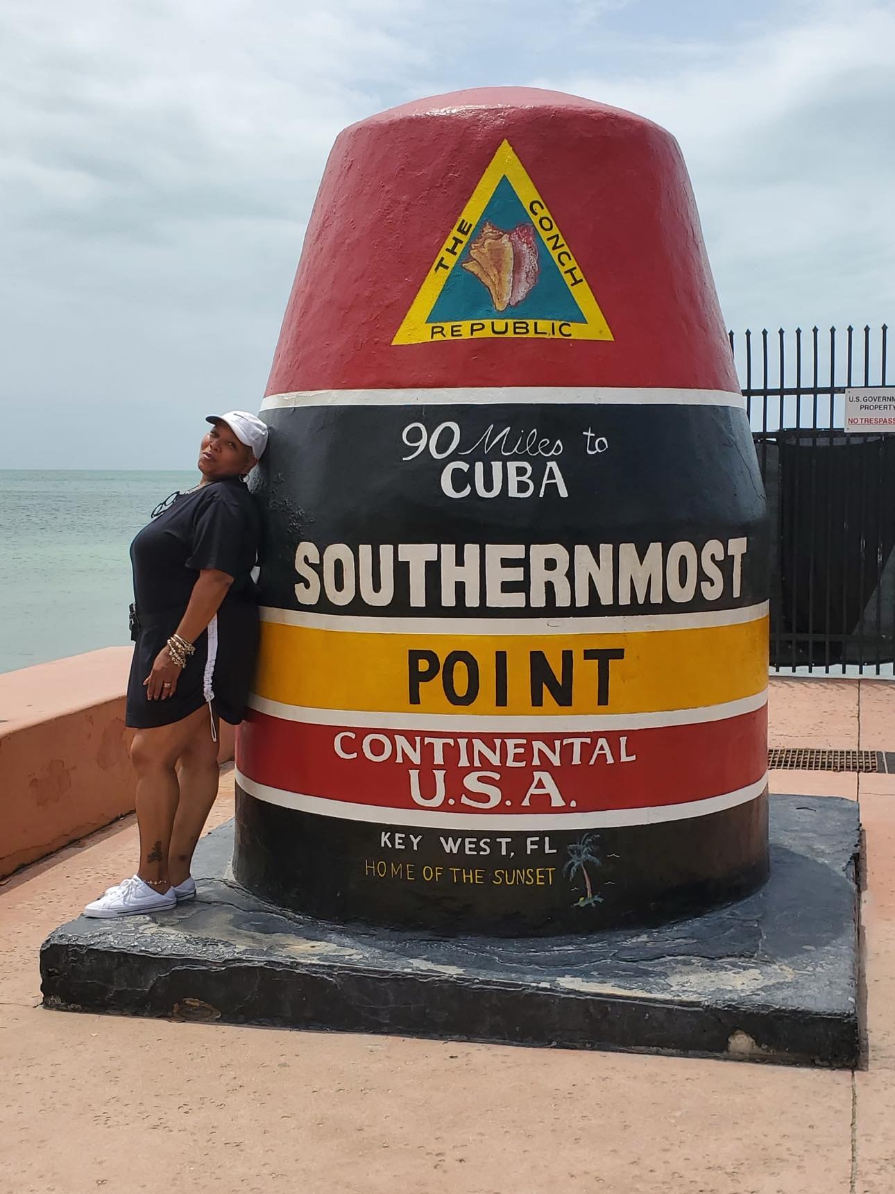 Mia at the Southernmost Point buoy in Key West FL